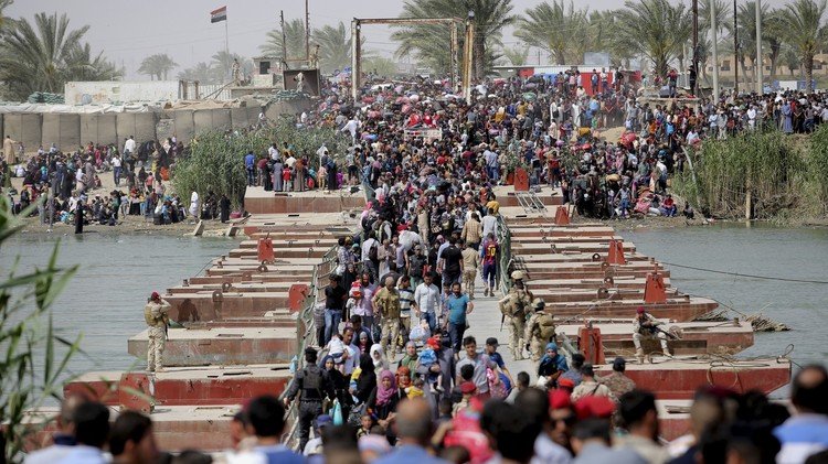 موجهة نزوح كبيرة من الرمادي بسبب الاشتباكات (فيديو + صور)