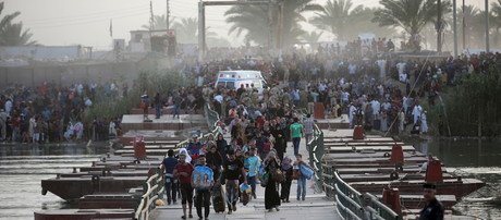 أهالي الرمادي يتركون منازلهم هرباً من المعارك بين "الدولة الإسلامية" والجيش العراقي