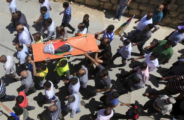 تشييع الطفل الرضيع دوابشة إلى مثواه الأخير (فيديو)