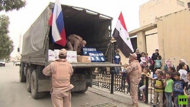 "حميميم" يوصل المساعدات الإنسانية إلى حلب ودير الزور