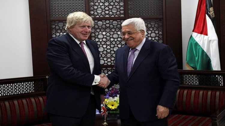 جونسون يؤكد لعباس دعم لندن لحل الدولتين