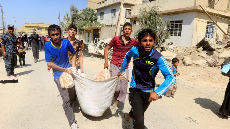 "داعش" يقتل عشرات المدنيين الفارين من حي الزنجيلي غرب الموصل