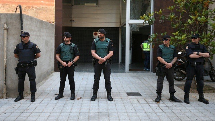 مجهول يصيب رجلي شرطة  في إسبانيا 