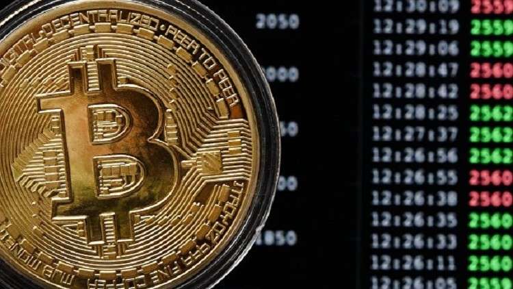 بيتكوين تقترب من 10 آلاف دولار