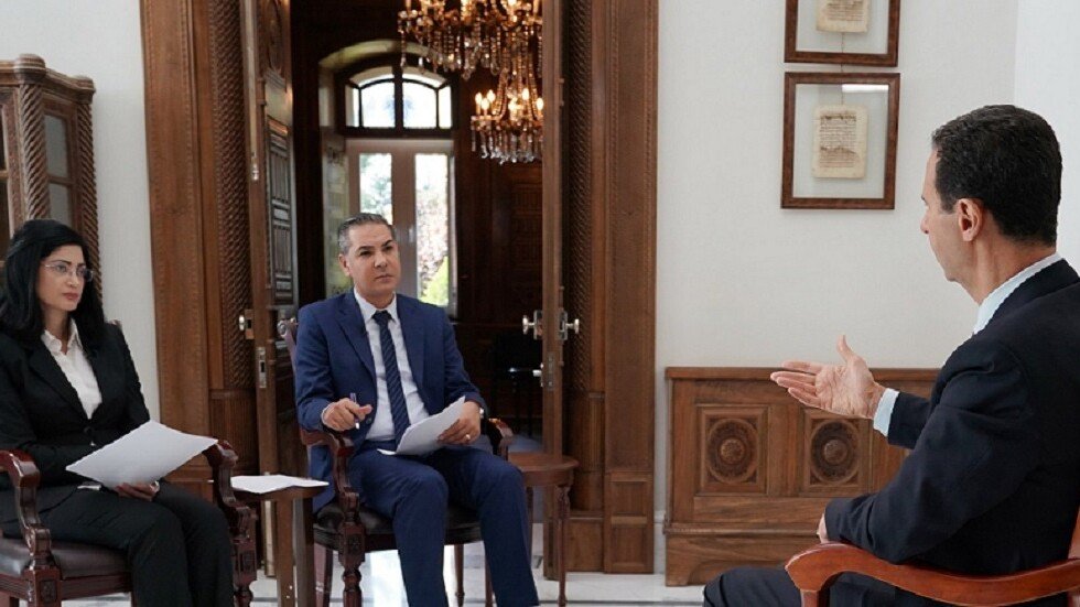 الأسد: البغدادي كان في السجون الأمريكية في العراق وأخرجوه ليلعب هذا الدور