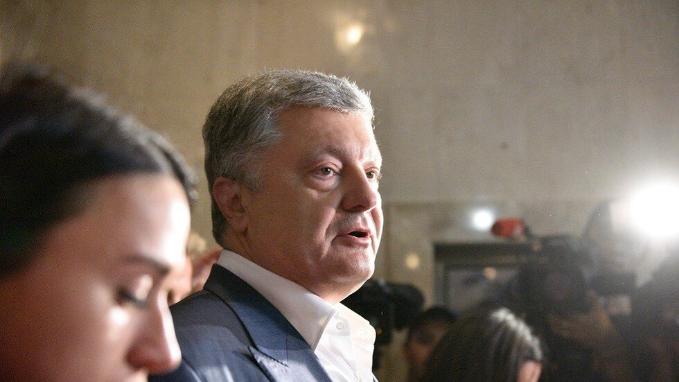 "وول ستريت جورنال": بارناسوس وفرومان وعدا بوروشينكو بزيارة دولة مقابل إجراء تحقيقات
