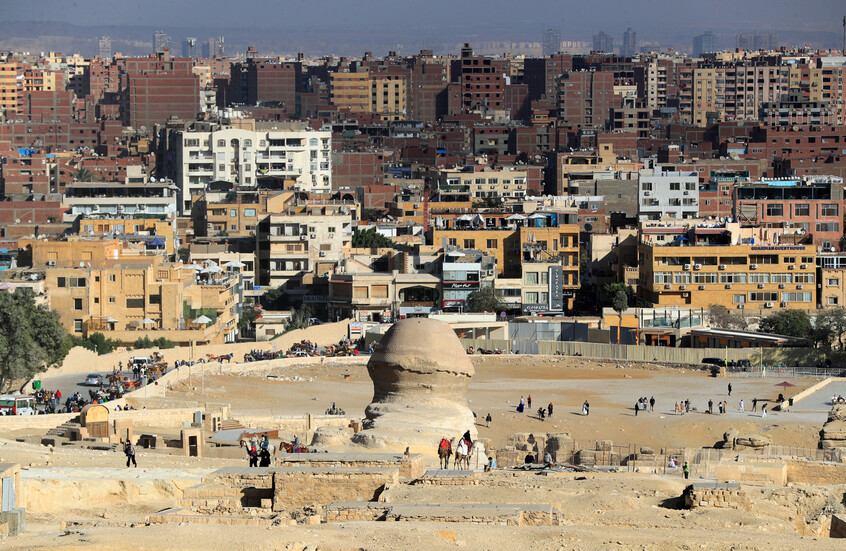 استمرار مشروع طلاء عمارات الدائري في مصر بـ"البيج" و"البرتقالي".. ما سبب اختيار هذين اللونين؟