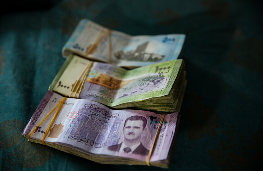 وزير الاقتصاد السوري السابق يحدد 6 نقاط إيجابية لتبديل العملة