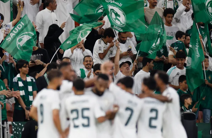لاعبو العراق يحتفلون بأحد أهدافهم