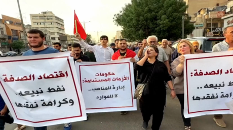 مظاهرات في بغداد ضد قرار الحكومة خفض قيمة العملة